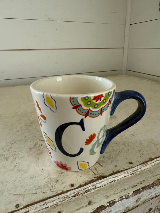 Floral C Mug has chips