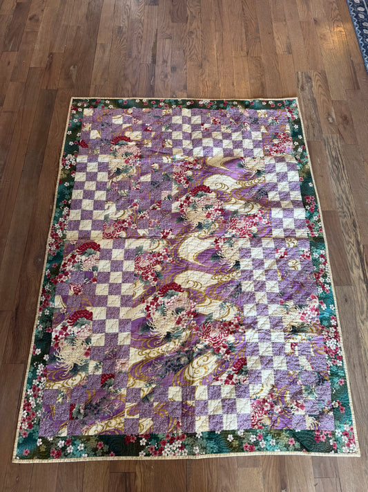 Handmade Quilt with a Japanese-inspired fabric with chrysanthemum and flowing wave patterns