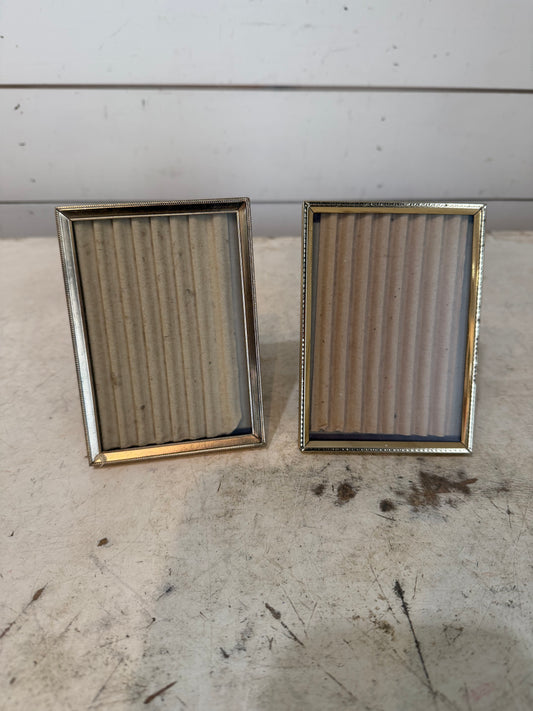 Set a small brass frames - will get art