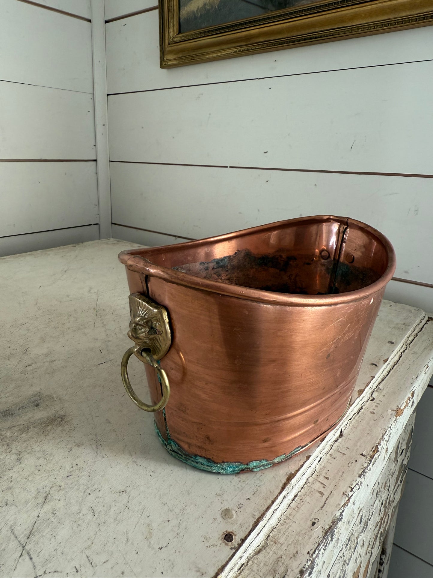 Vintage copper bucket with brass lion handles