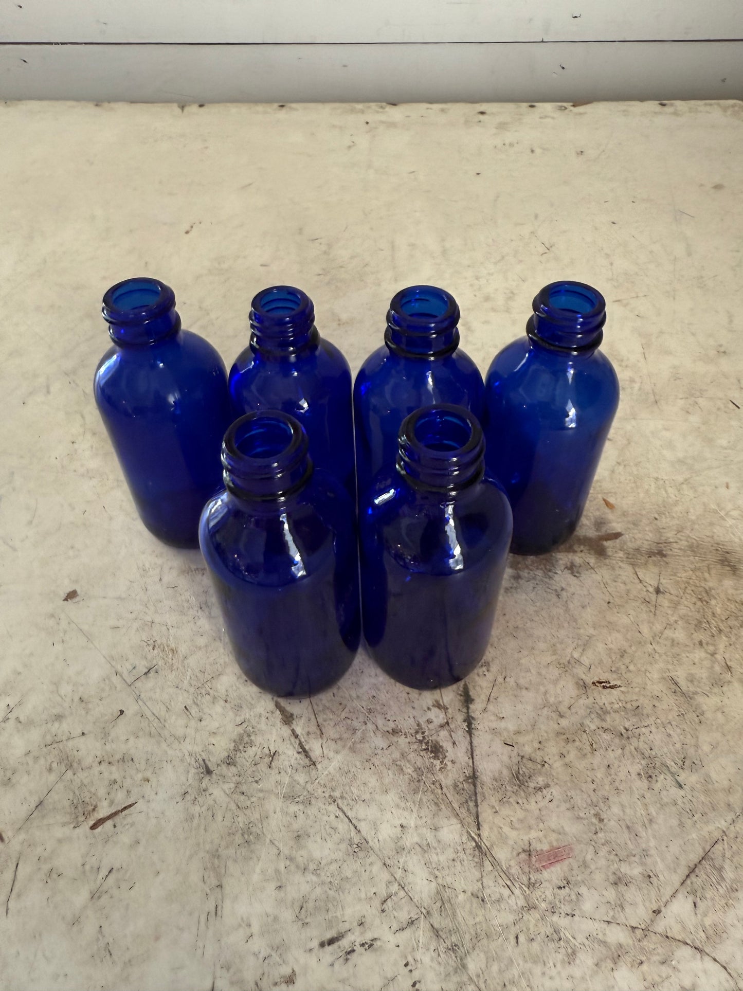 Cobalt blue and amber bottles sold individually