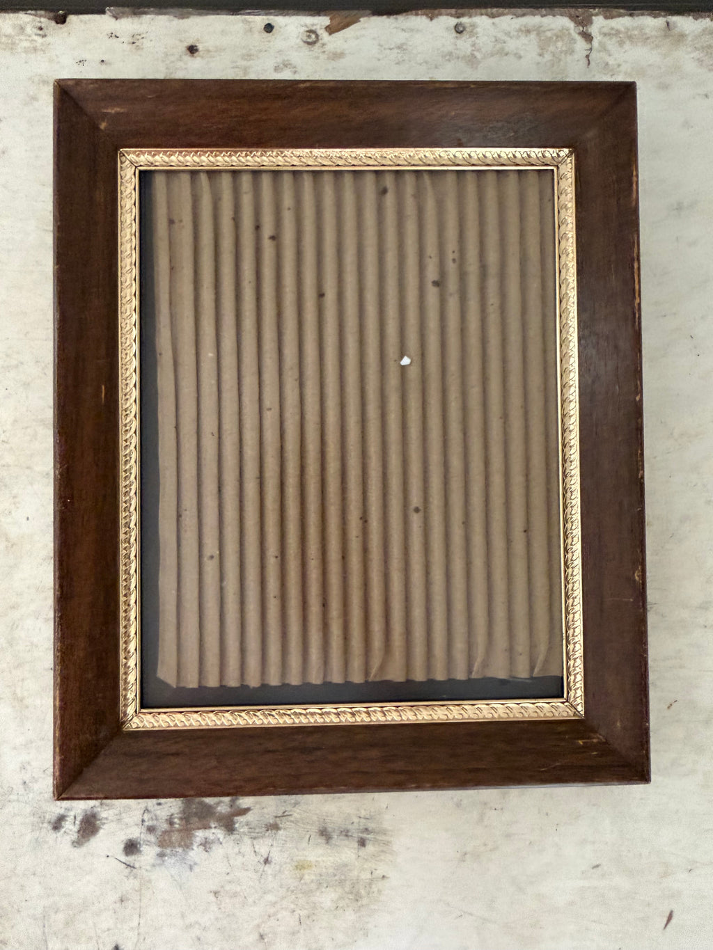 Brass and wood frame will get art