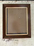 Brass and wood frame will get art