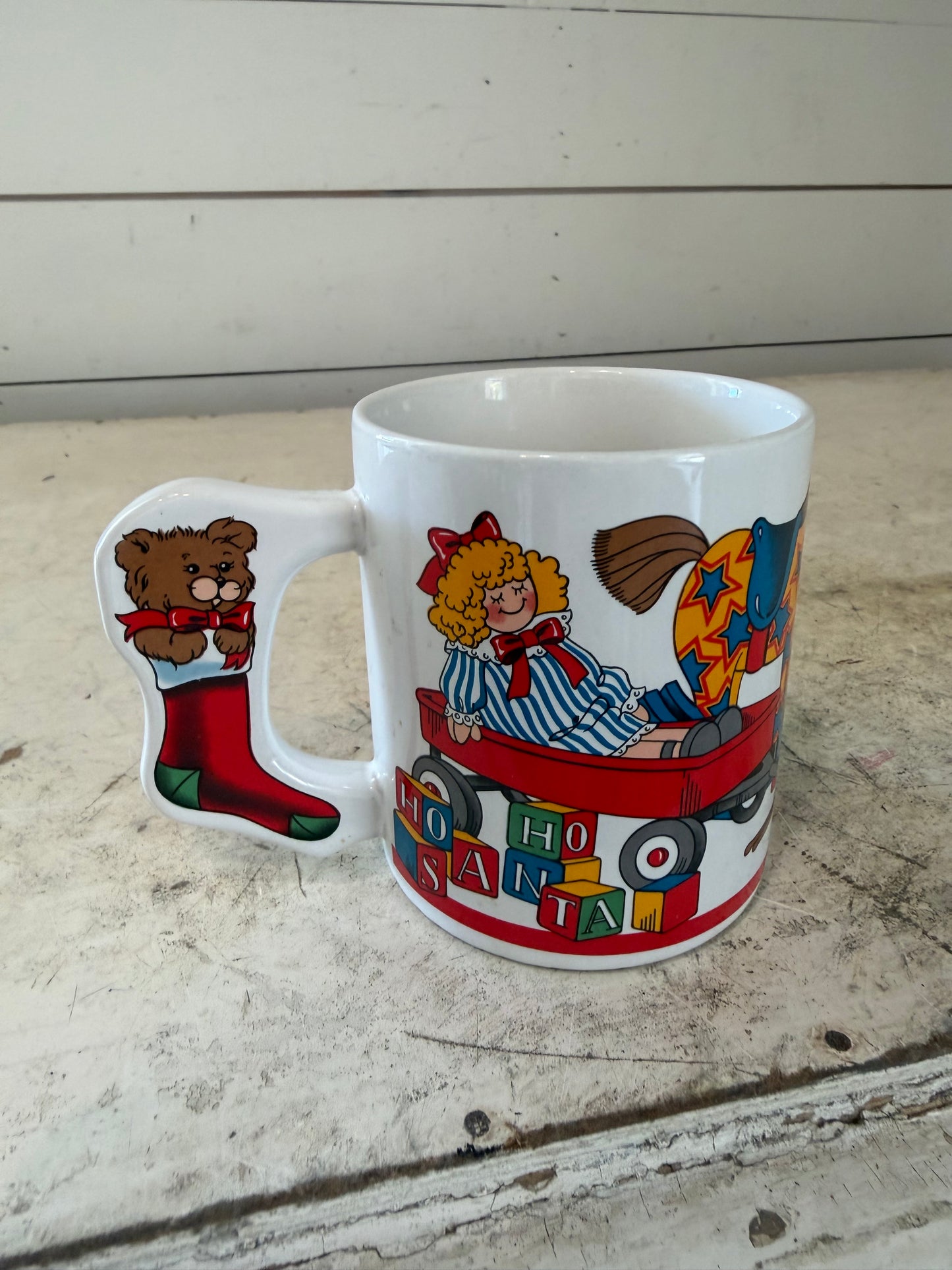 Christmas cup with stocking shaped handle
