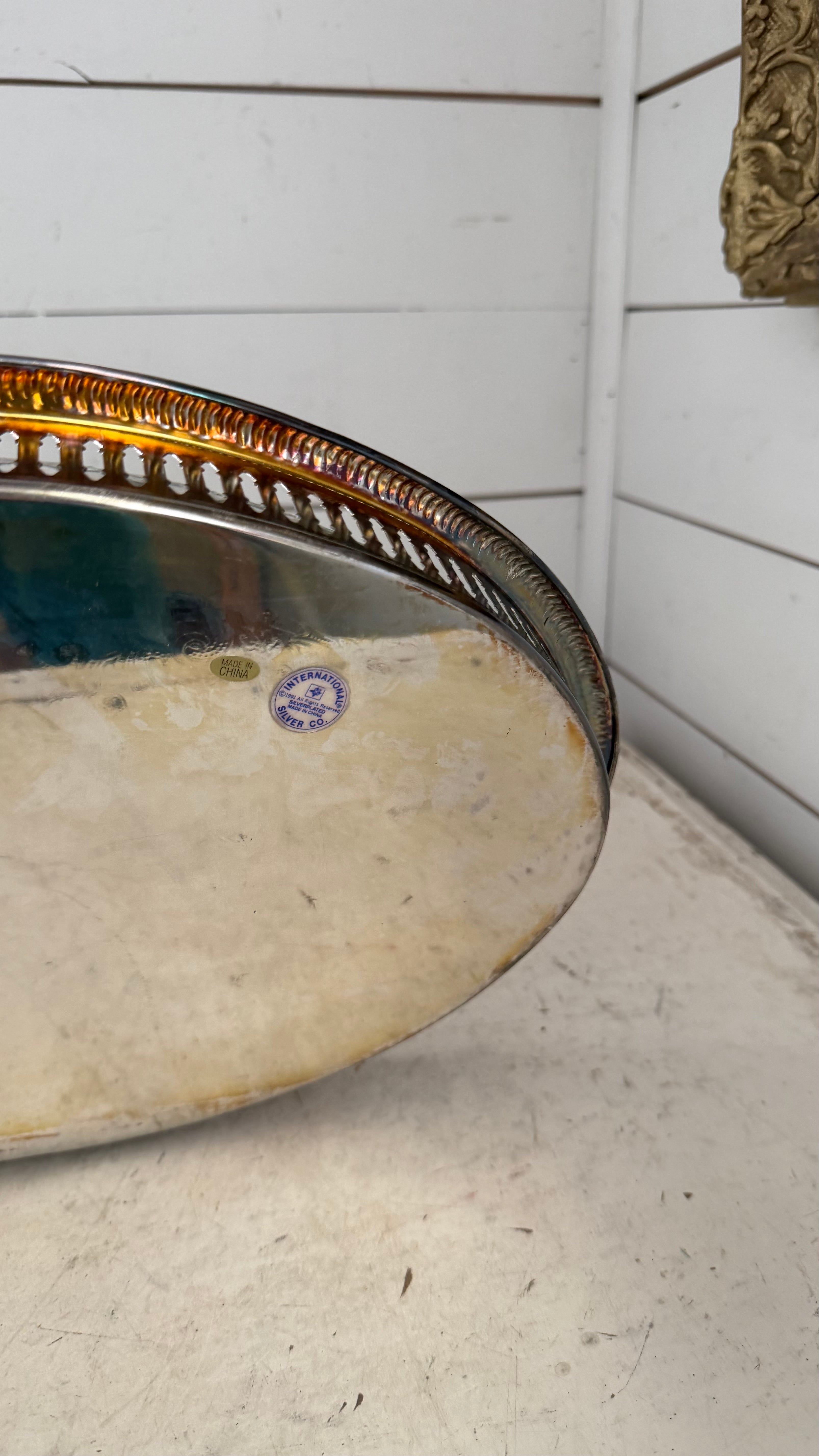 silver-plated relish tray features a removable divided crystal insert with a radiating pattern.