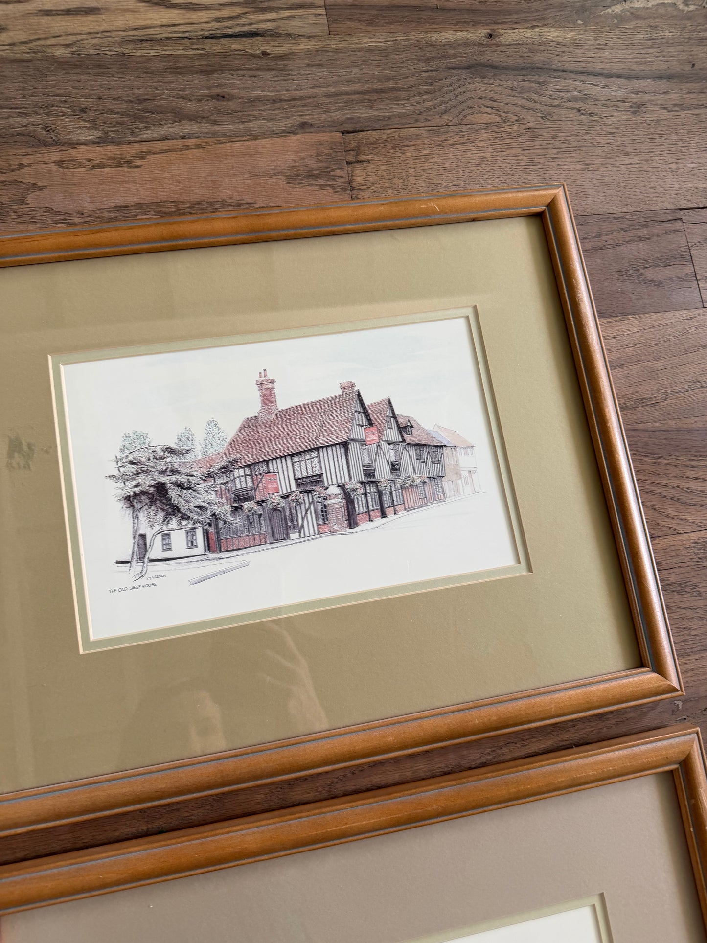 Set of four historic English buildings framed and professionally matted