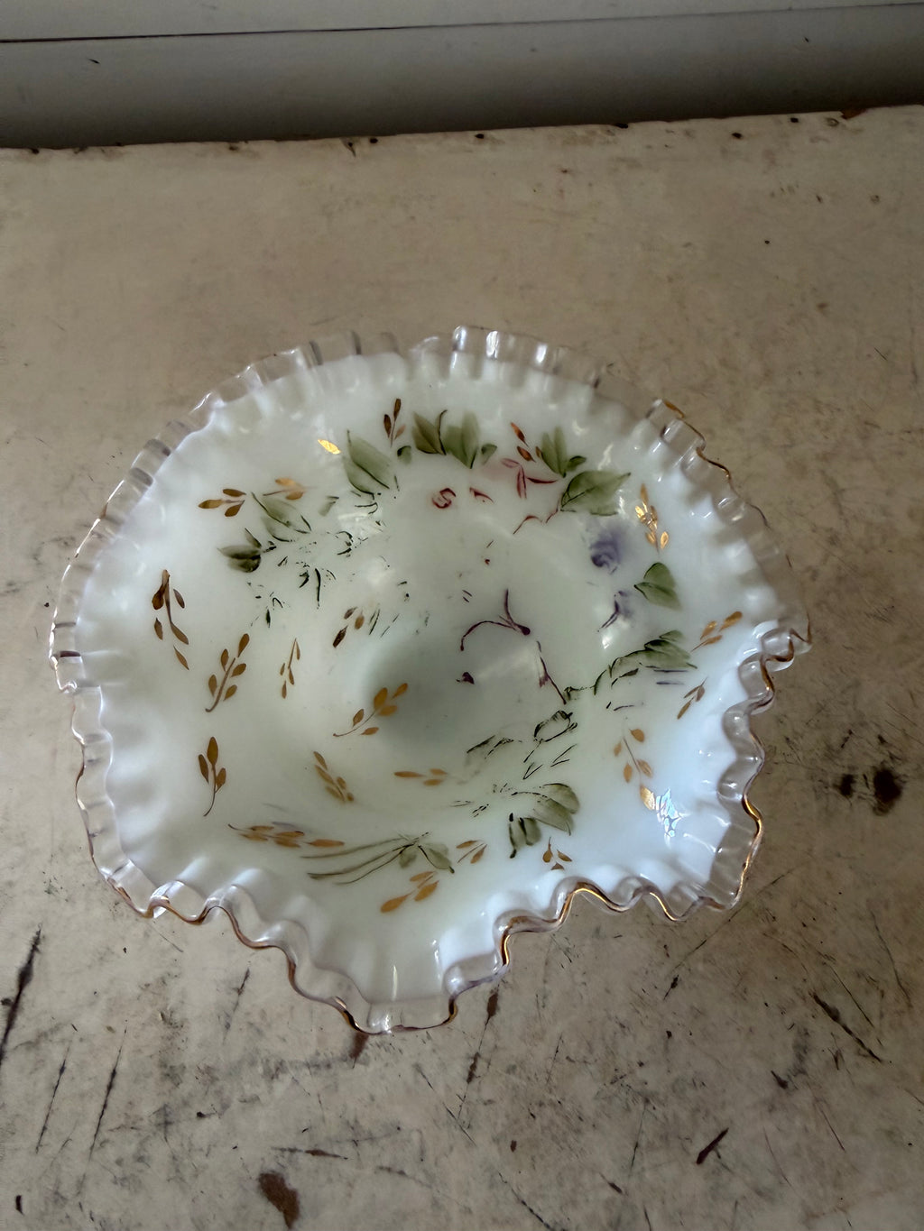 vintage Fenton Glass ruffled bowl featuring a delicate hand-painted floral design with gold trim