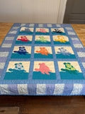 Handcrafted sea turtle-themed baby quilt