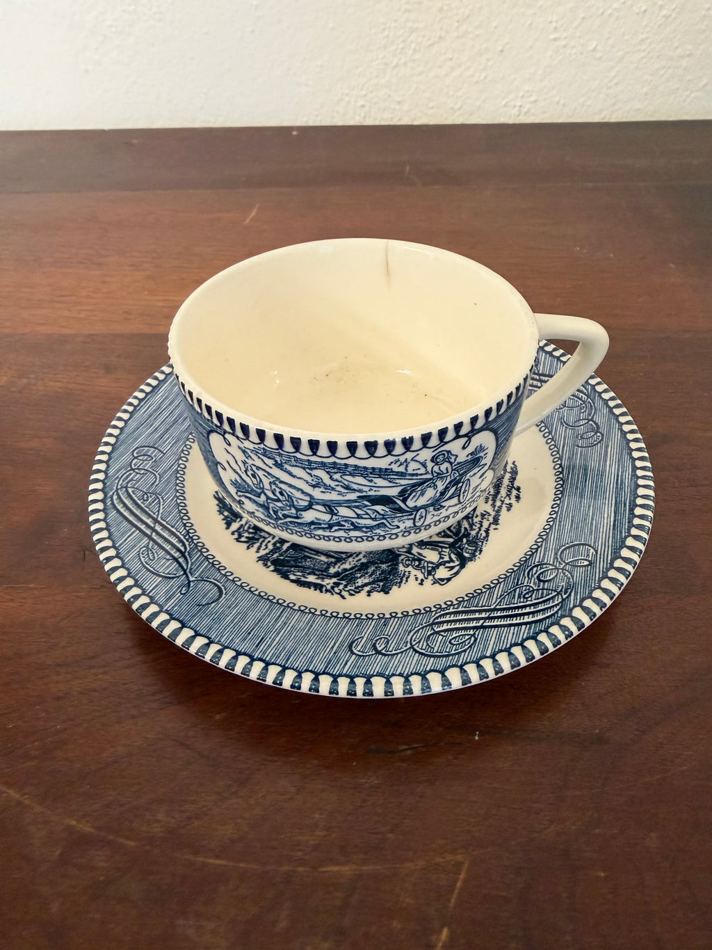 Vintage Currier and Ives Blue Flat Cup and Saucer