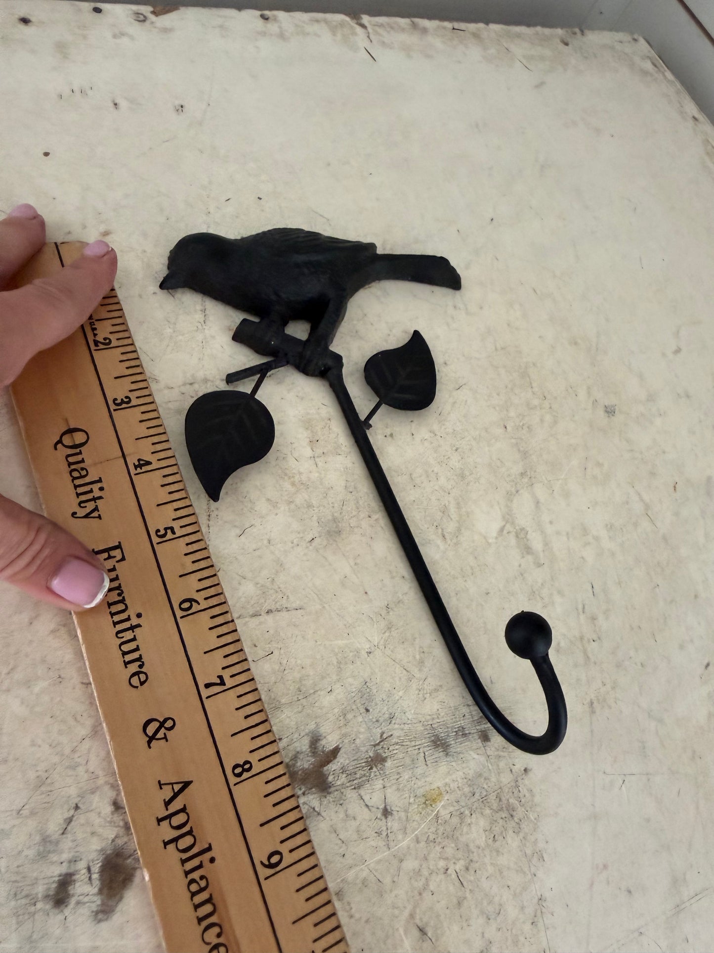 Cast-iron bird hook