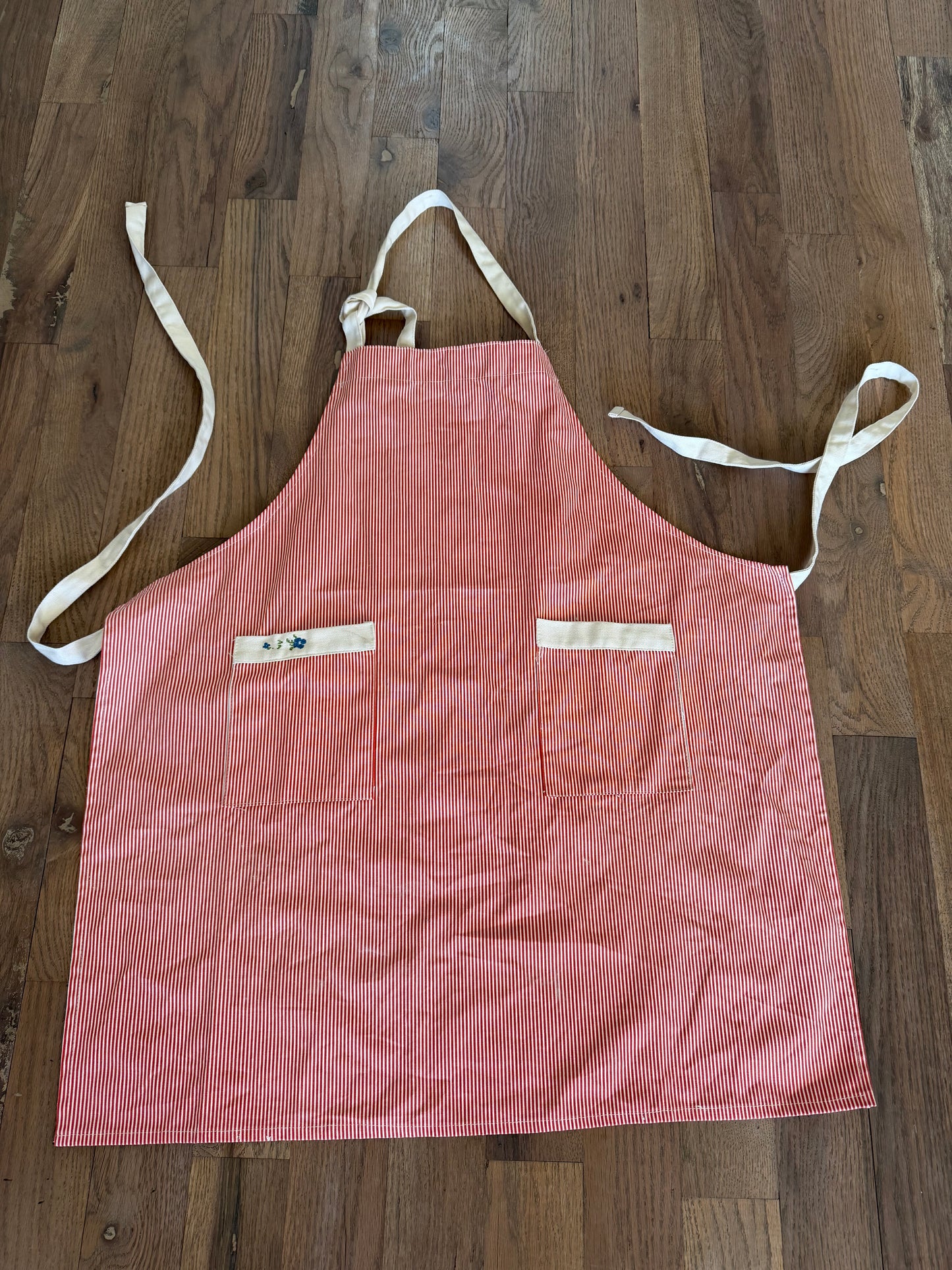 Homemade red and white striped apron with Embroidered Pocket