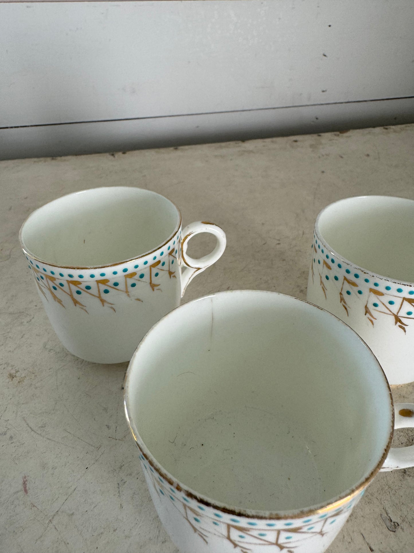 Vintage gold turquoise tea cups sold individually, has cracks and imperfections as shown