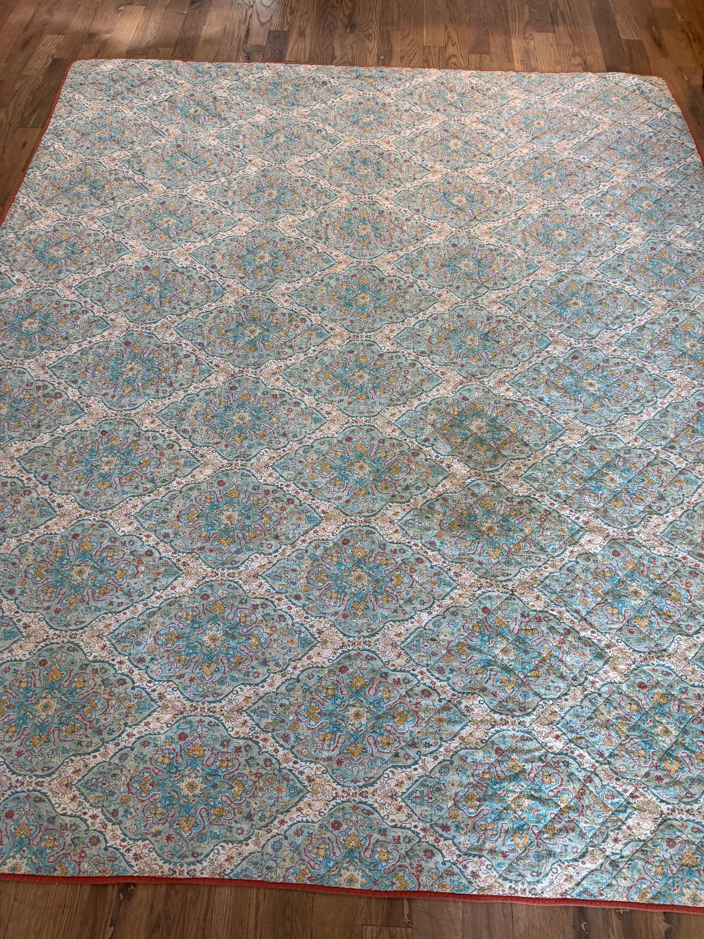 Queen size bohemian turquoise, and coral quilt