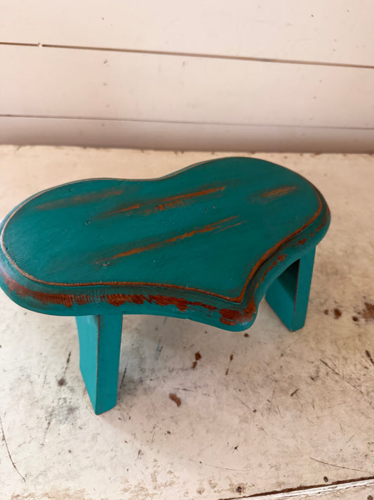 Wood heart-shaped stool painted turquoise
