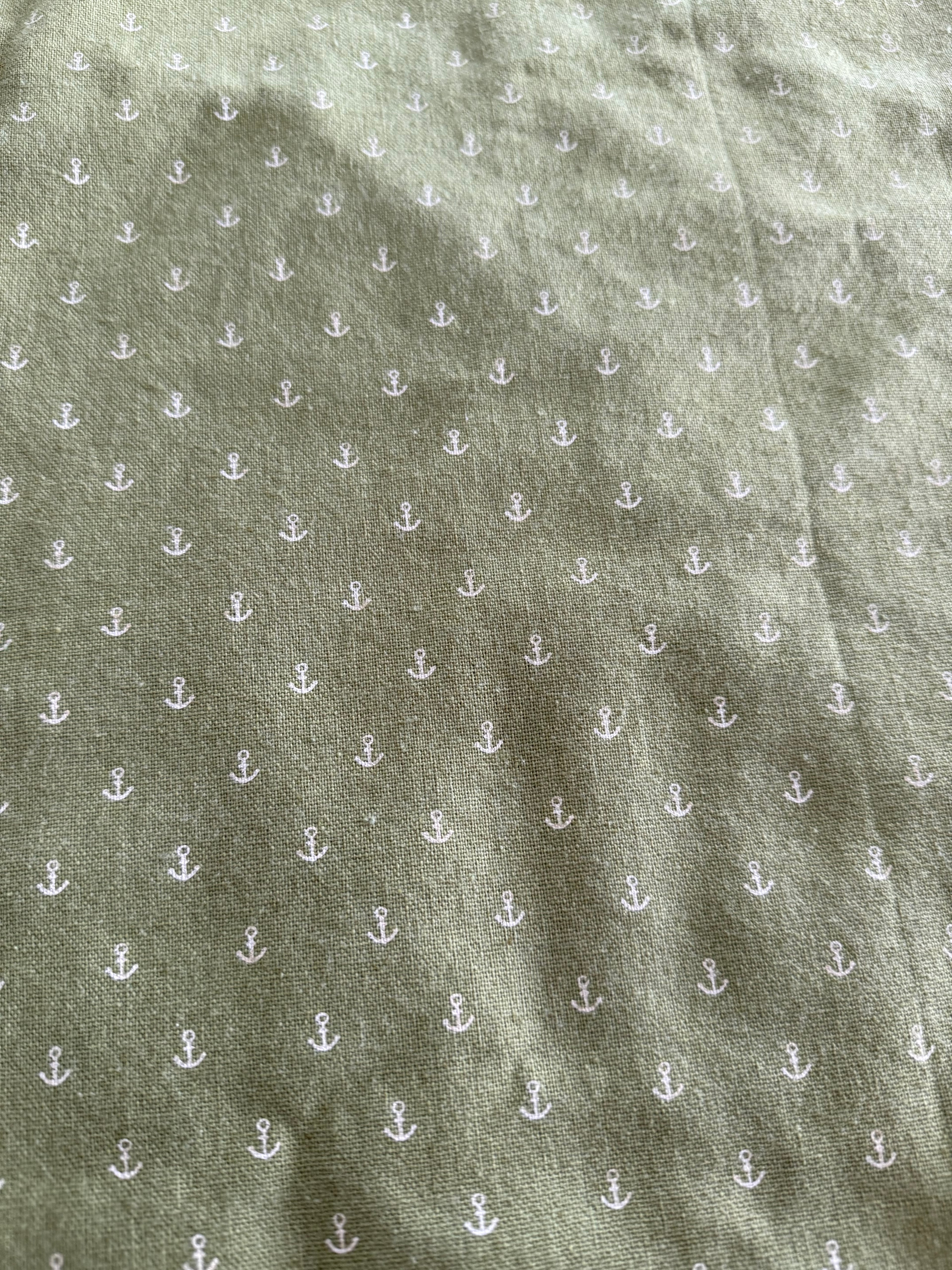 20 inches green fabric with little anchors