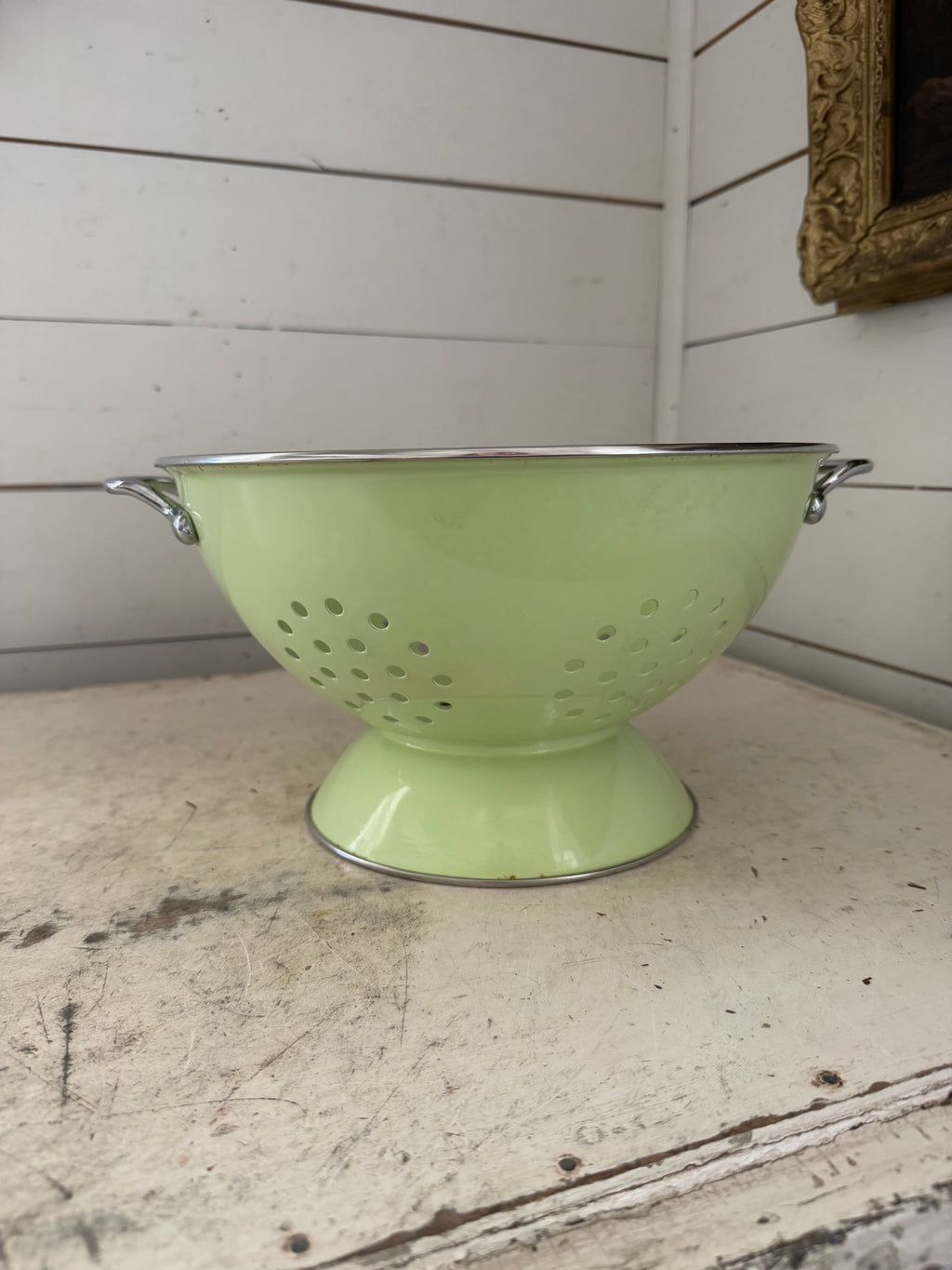 Green colander with handles