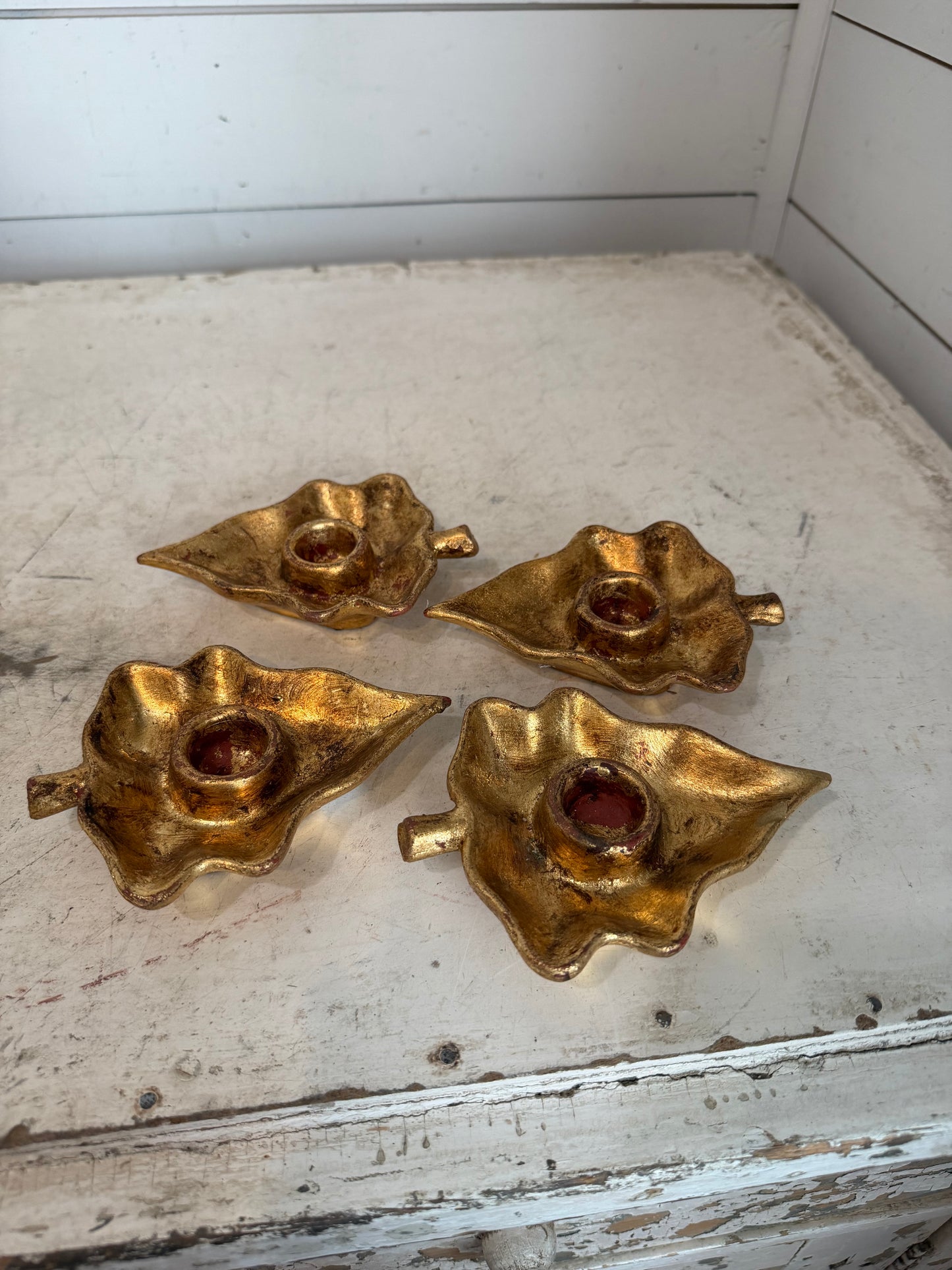 Set of four Vietri Italian gold gilt leaf-shaped candle holders