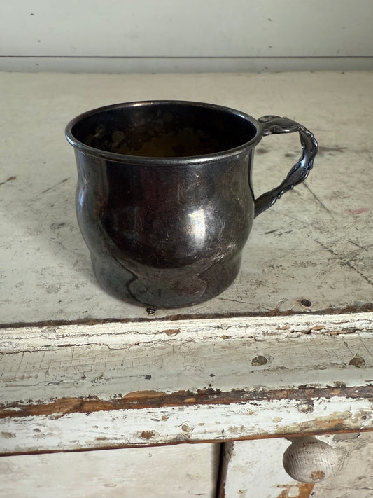 Silver plated baby cup made by community