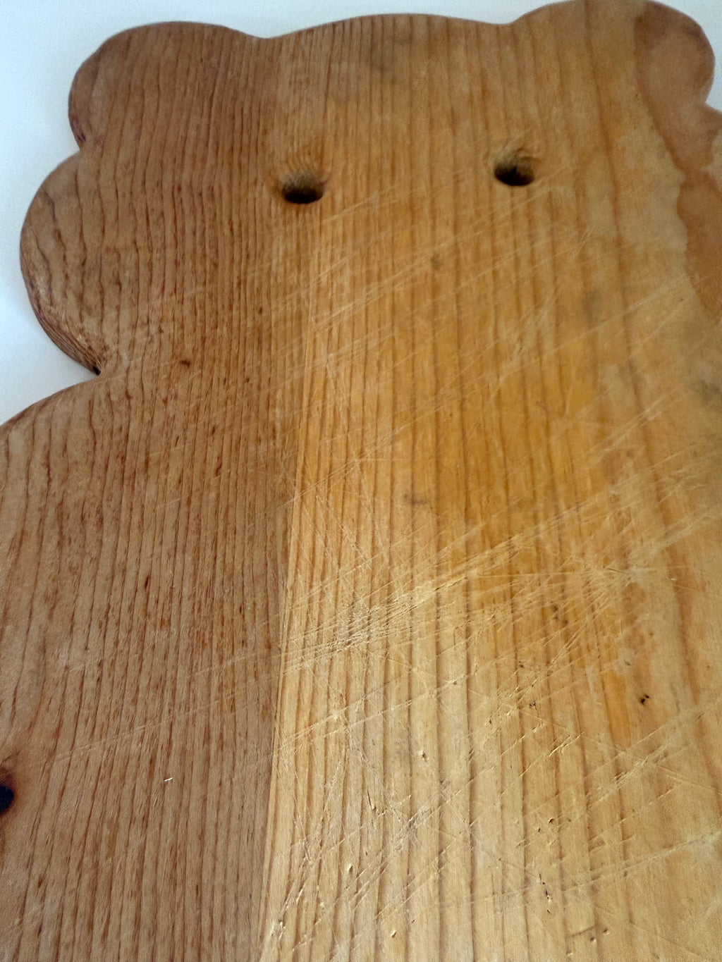 Vintage wooden teddy bear-shaped cutting board