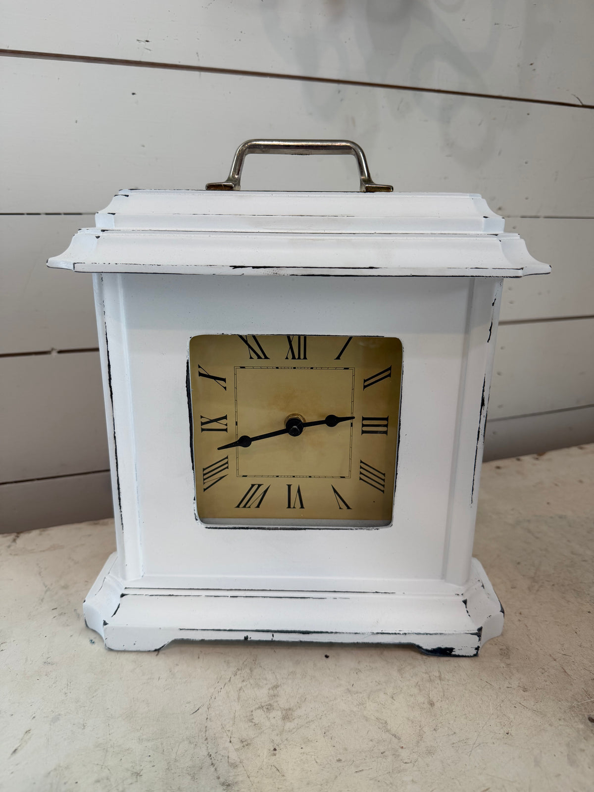 Hand-painted white clock with pull on top