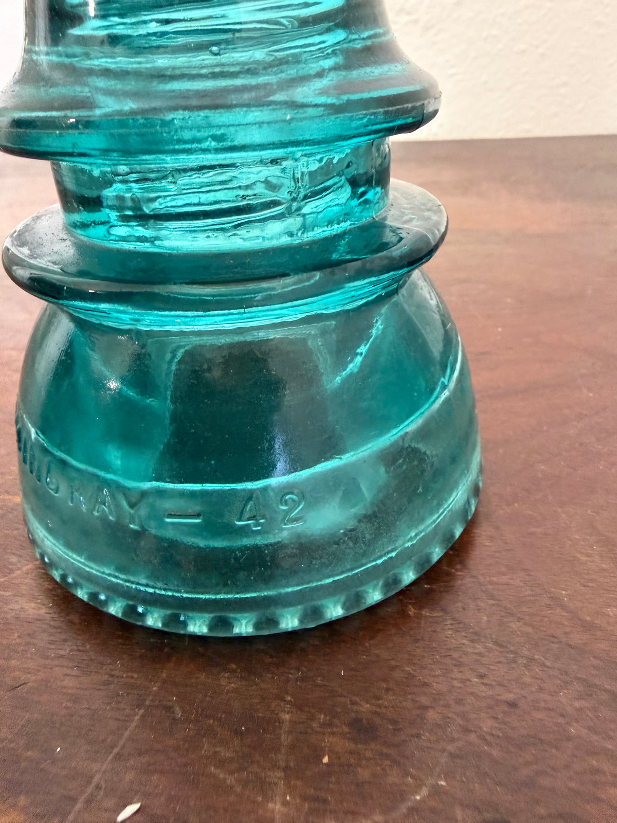 Antique blue green insulator