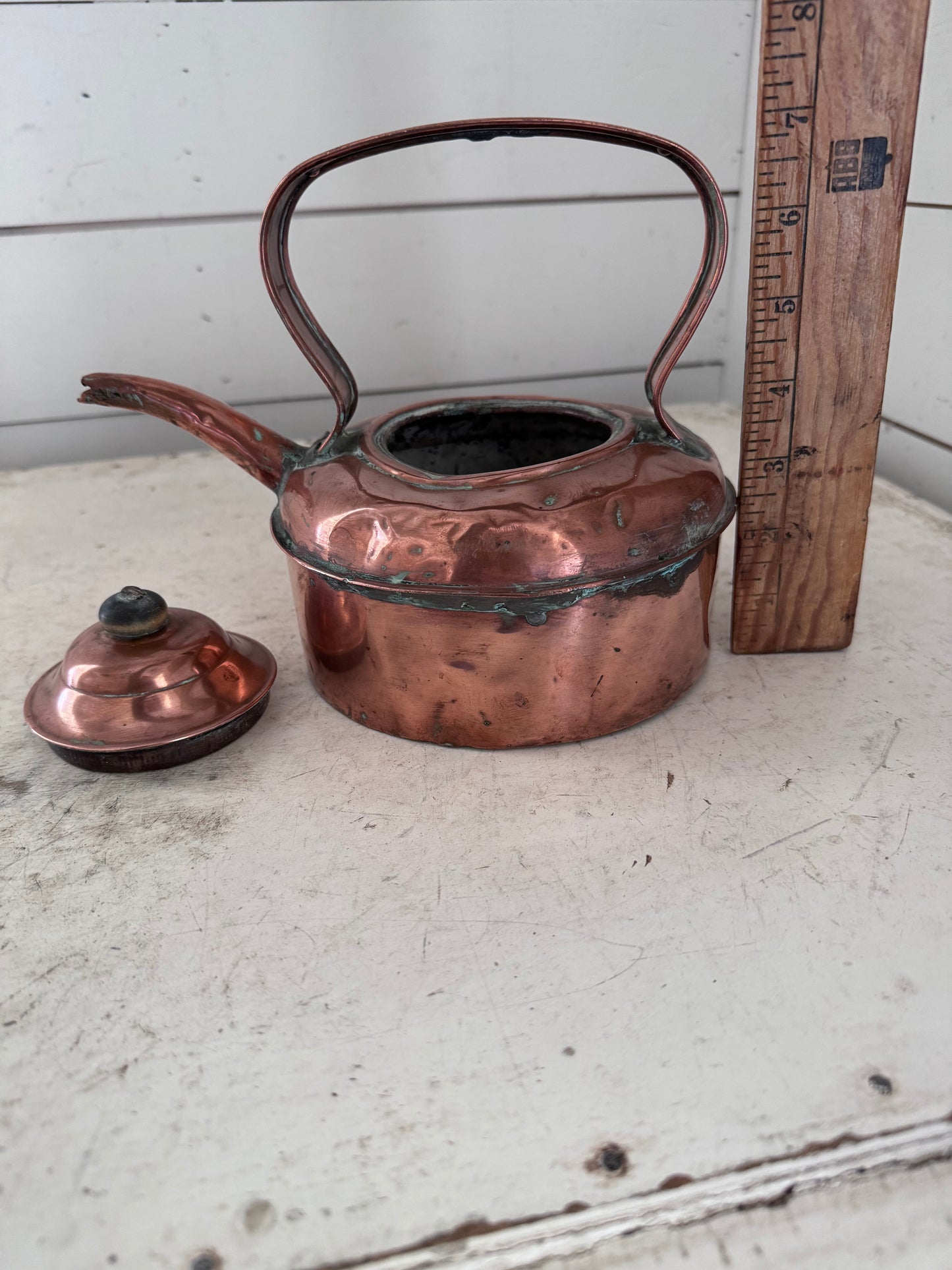 Copper kettle with flat copper strap handle