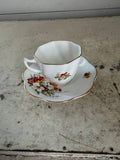 Vintage bone china teacup and saucer set with an octagonal cup