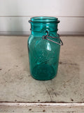 Vintage teal-blue glass Ball Ideal Mason jar With American Eagle Emblem (missing lid)