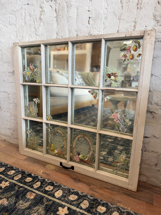 Window with old glass and mirror behind