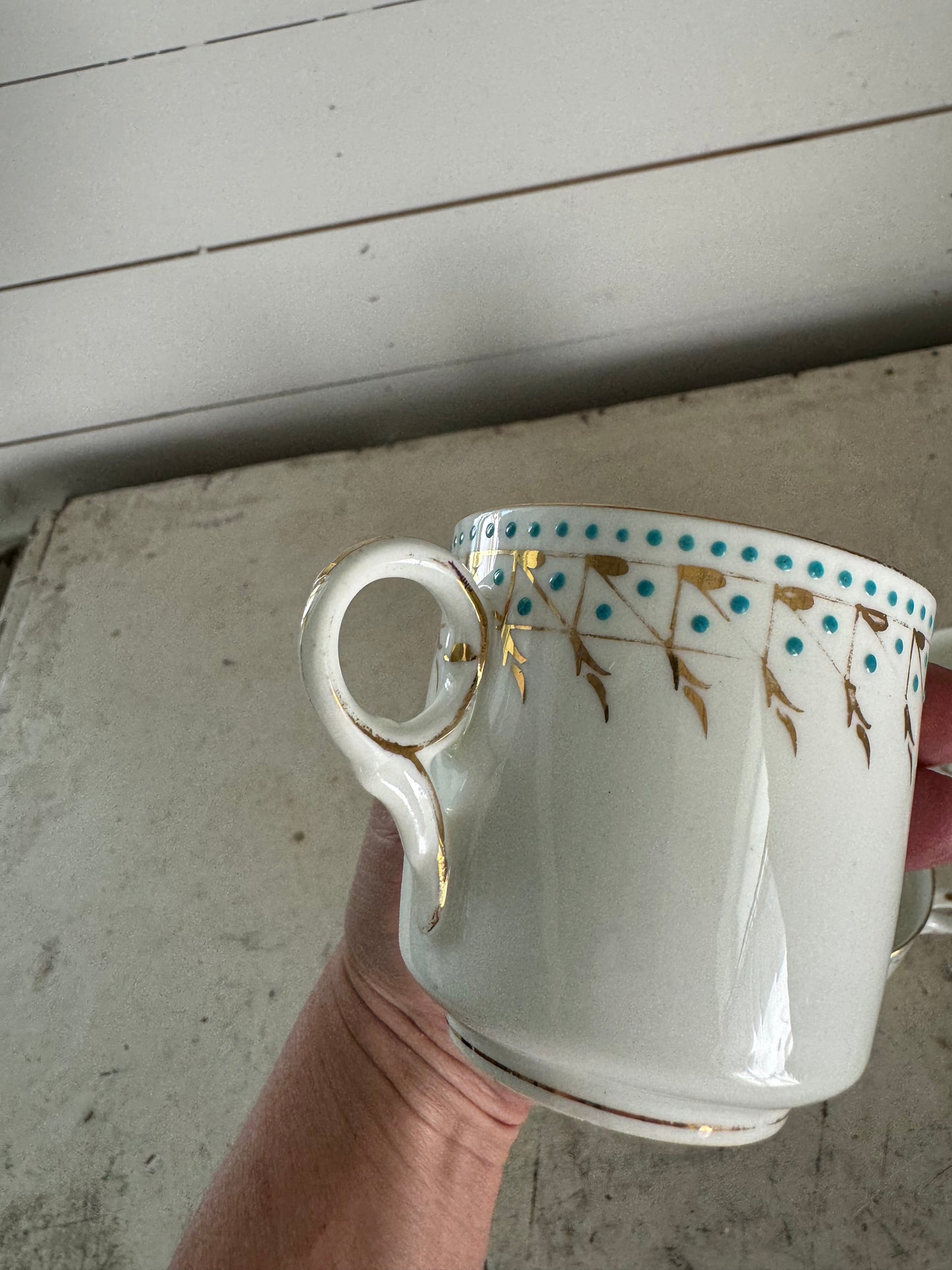 Vintage gold turquoise tea cups sold individually, has cracks and imperfections as shown