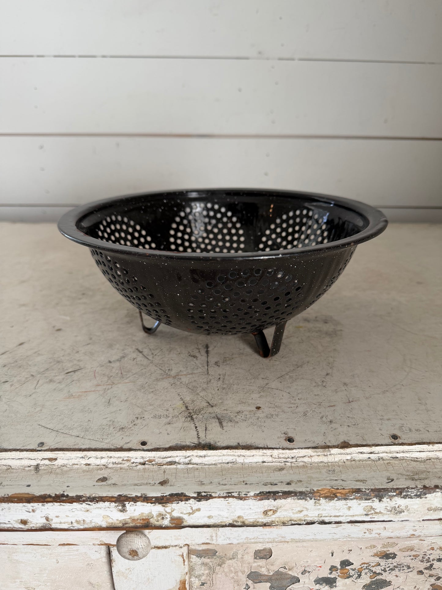 Vintage black speckled enamel colander - has some chips