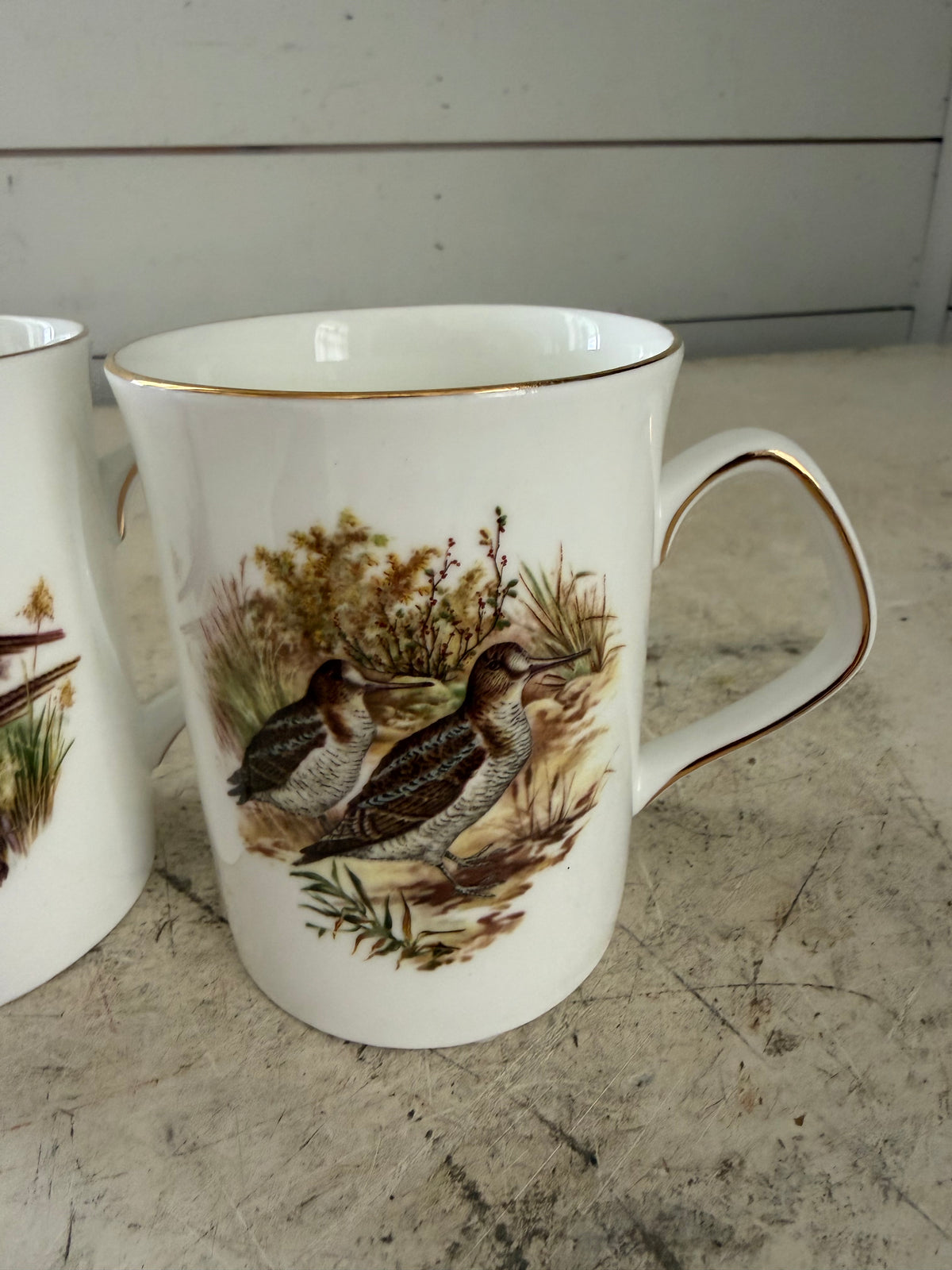 Set of bone China bird mugs
