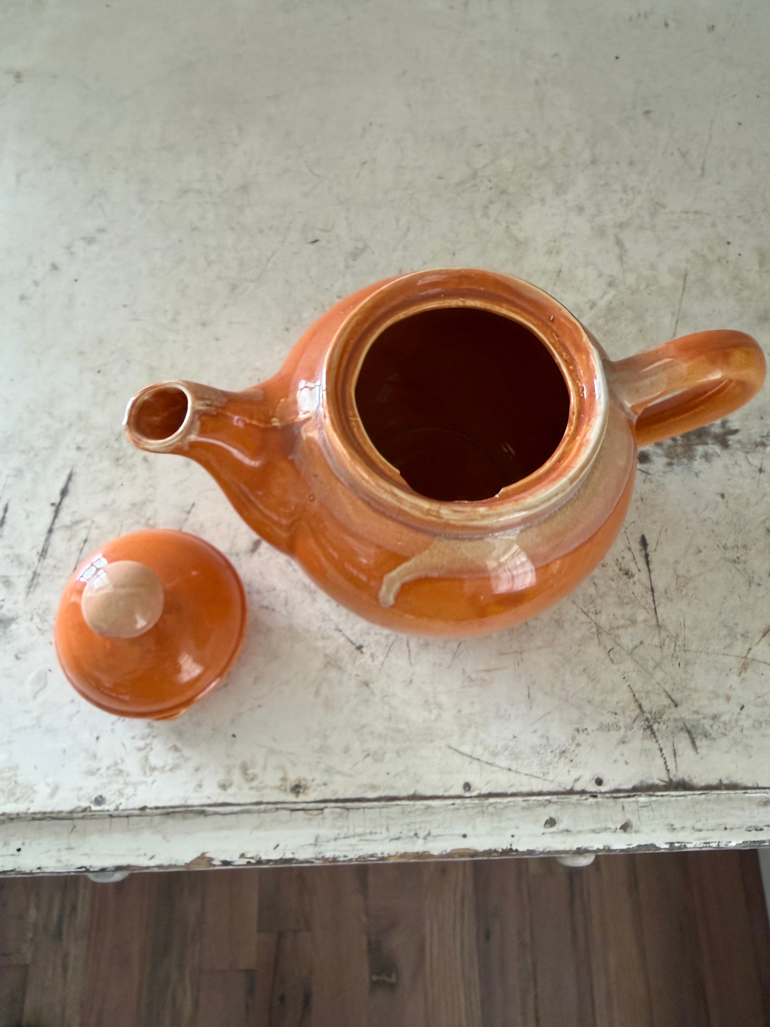 Ceramic orange glazed tea pot has some chip under lid - Madd in Japan