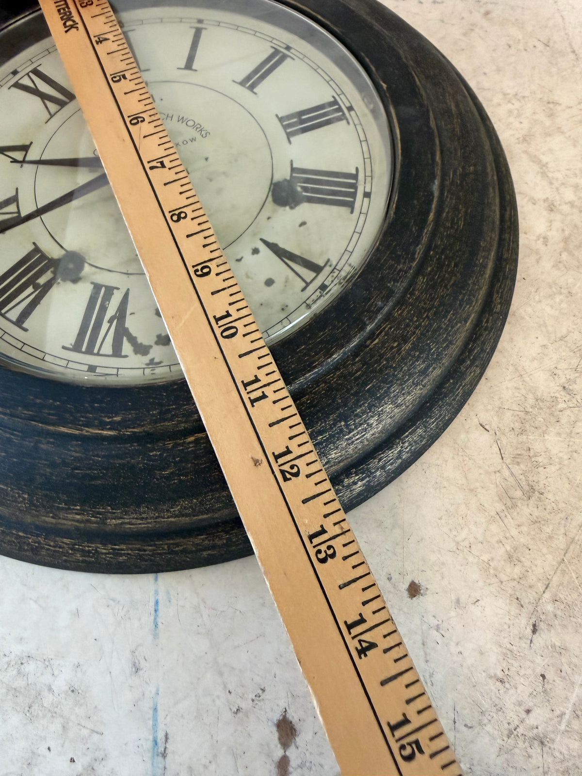 Round clock will have clock removed and get makeover with art