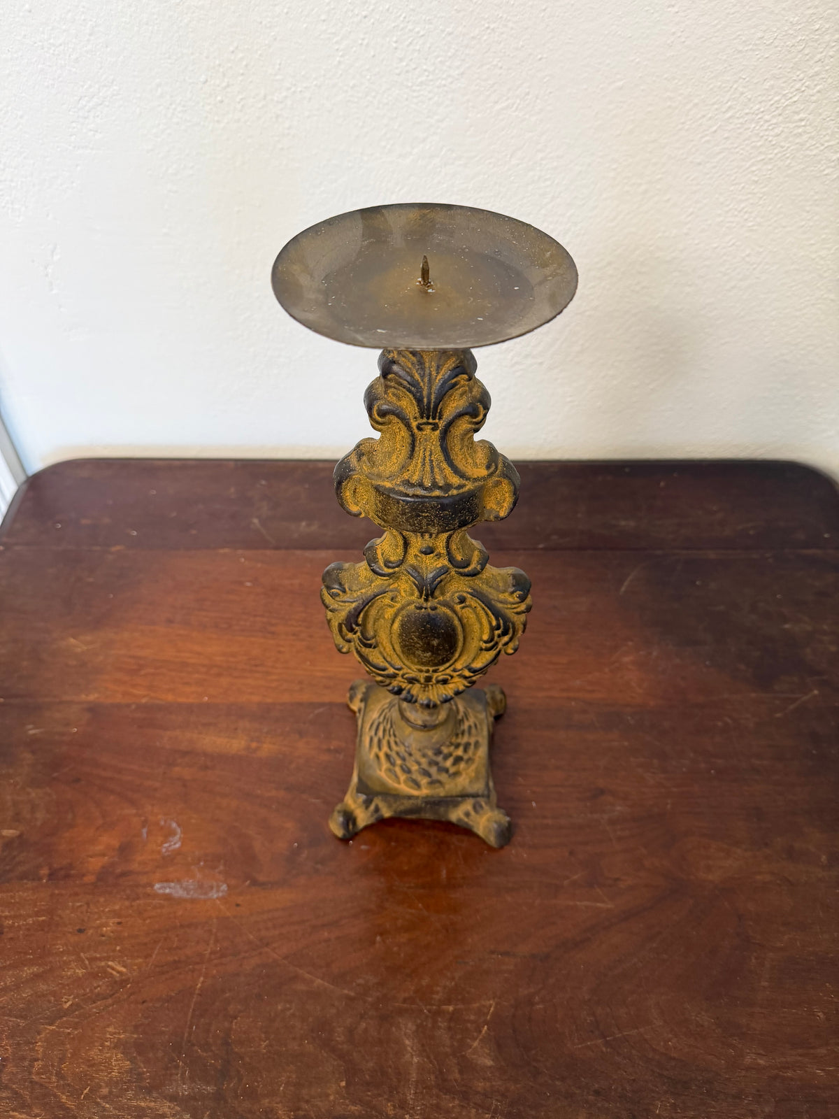 Baroque-style cast iron candlestick holder