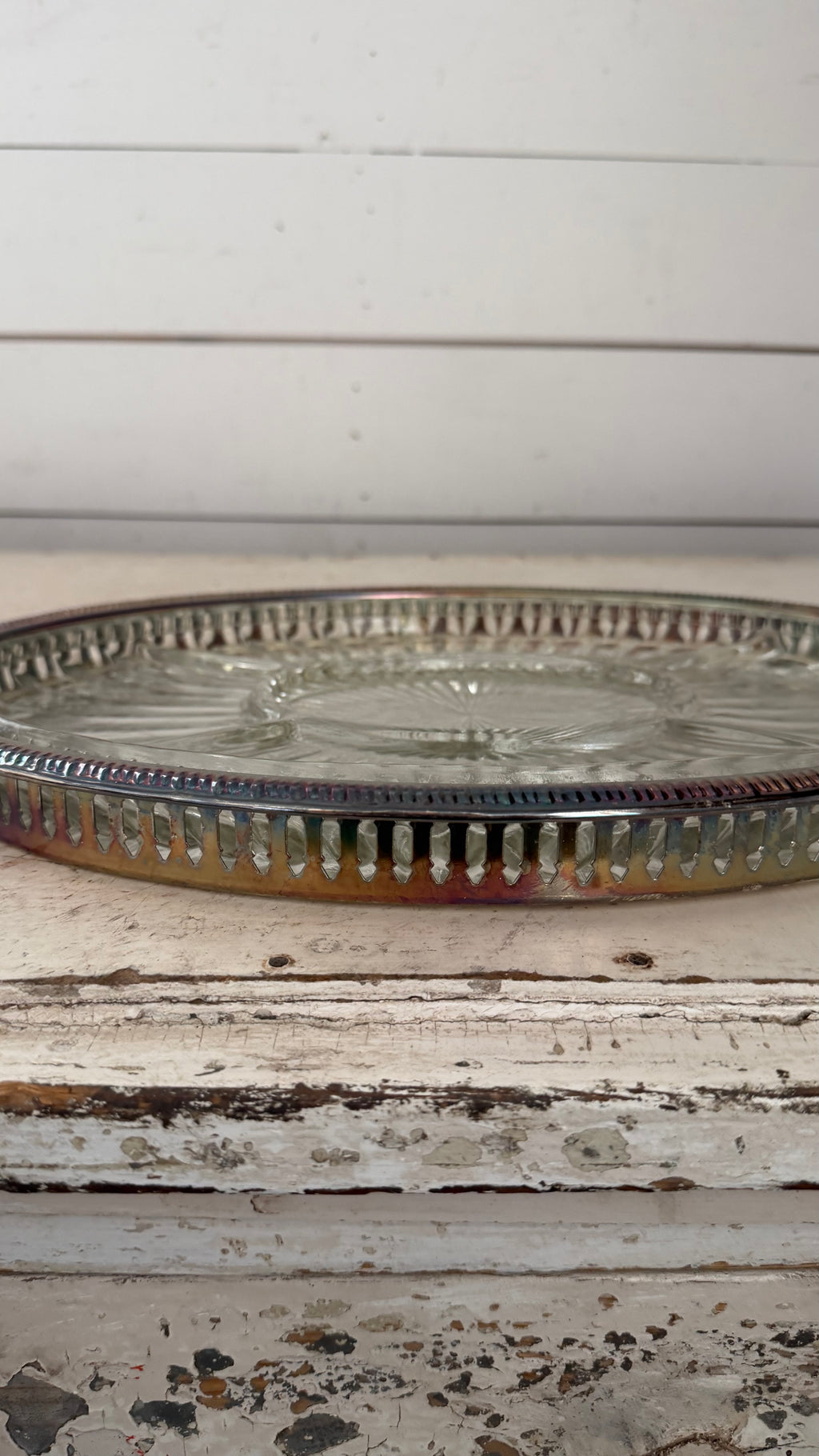 silver-plated relish tray features a removable divided crystal insert with a radiating pattern.