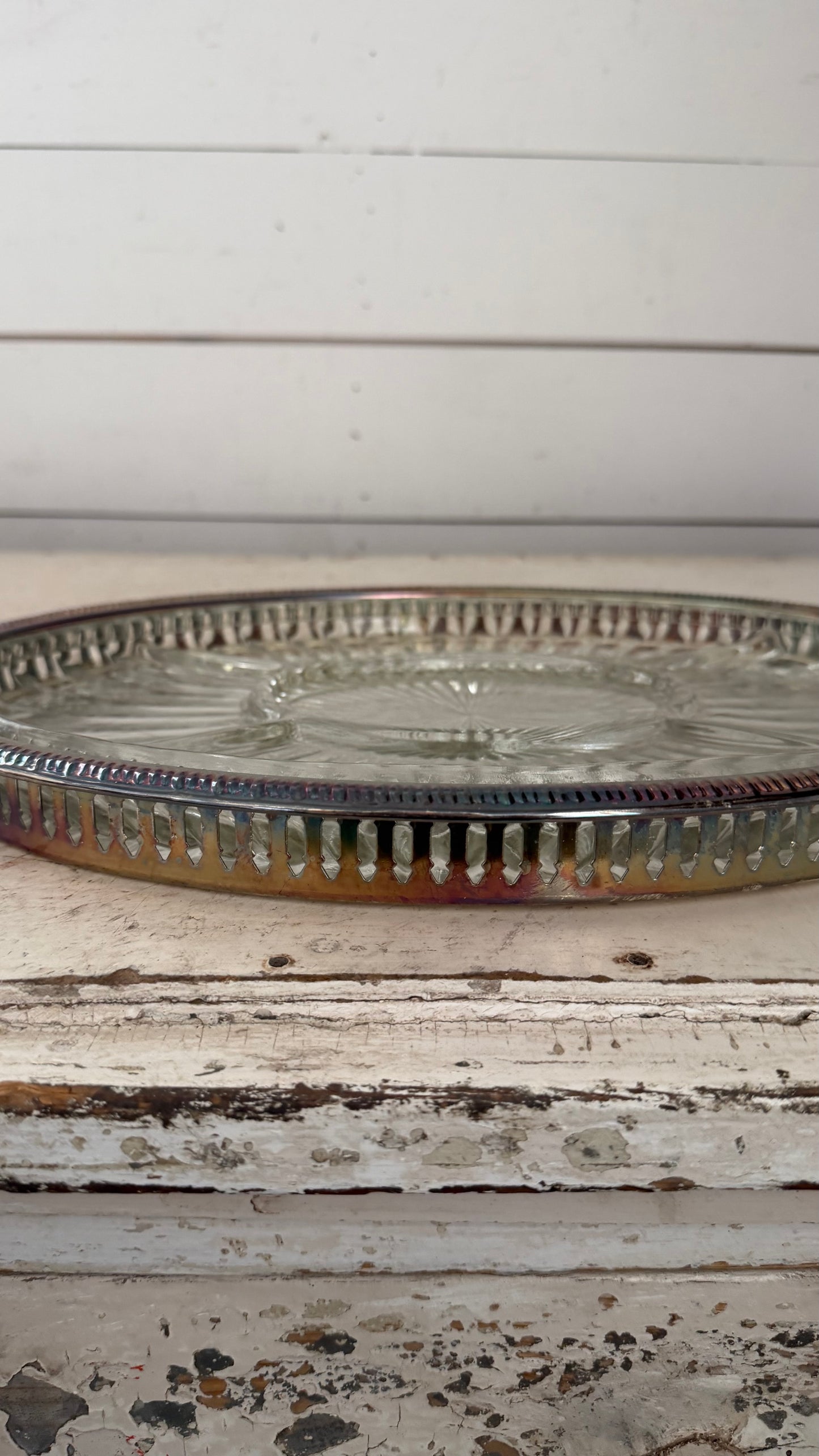 silver-plated relish tray features a removable divided crystal insert with a radiating pattern.