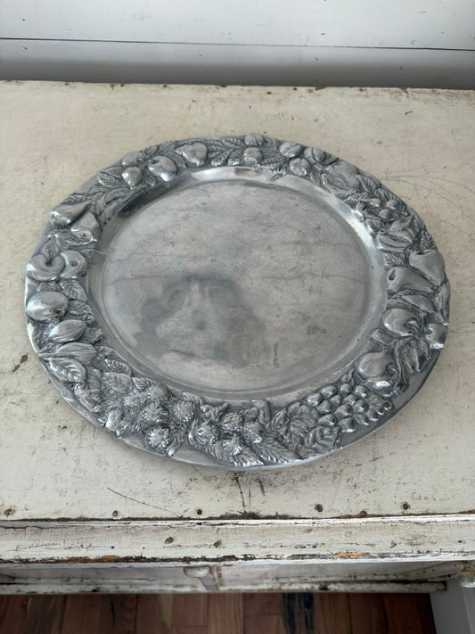 Mexican pewter / aluminum serving platter with a fruit and vine motif.