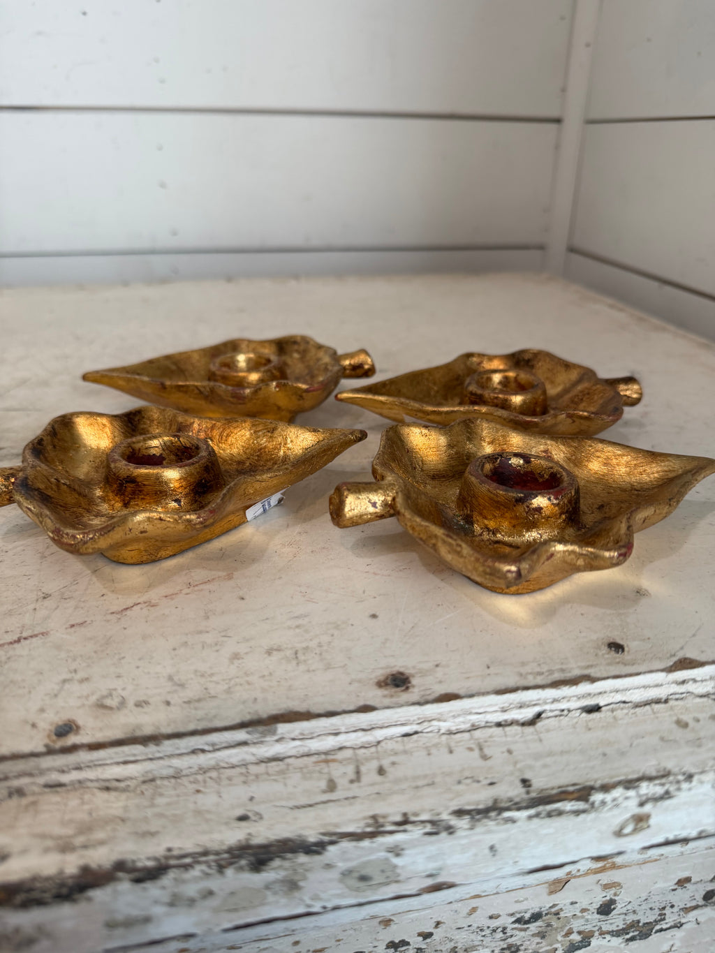Set of four Vietri Italian gold gilt leaf-shaped candle holders