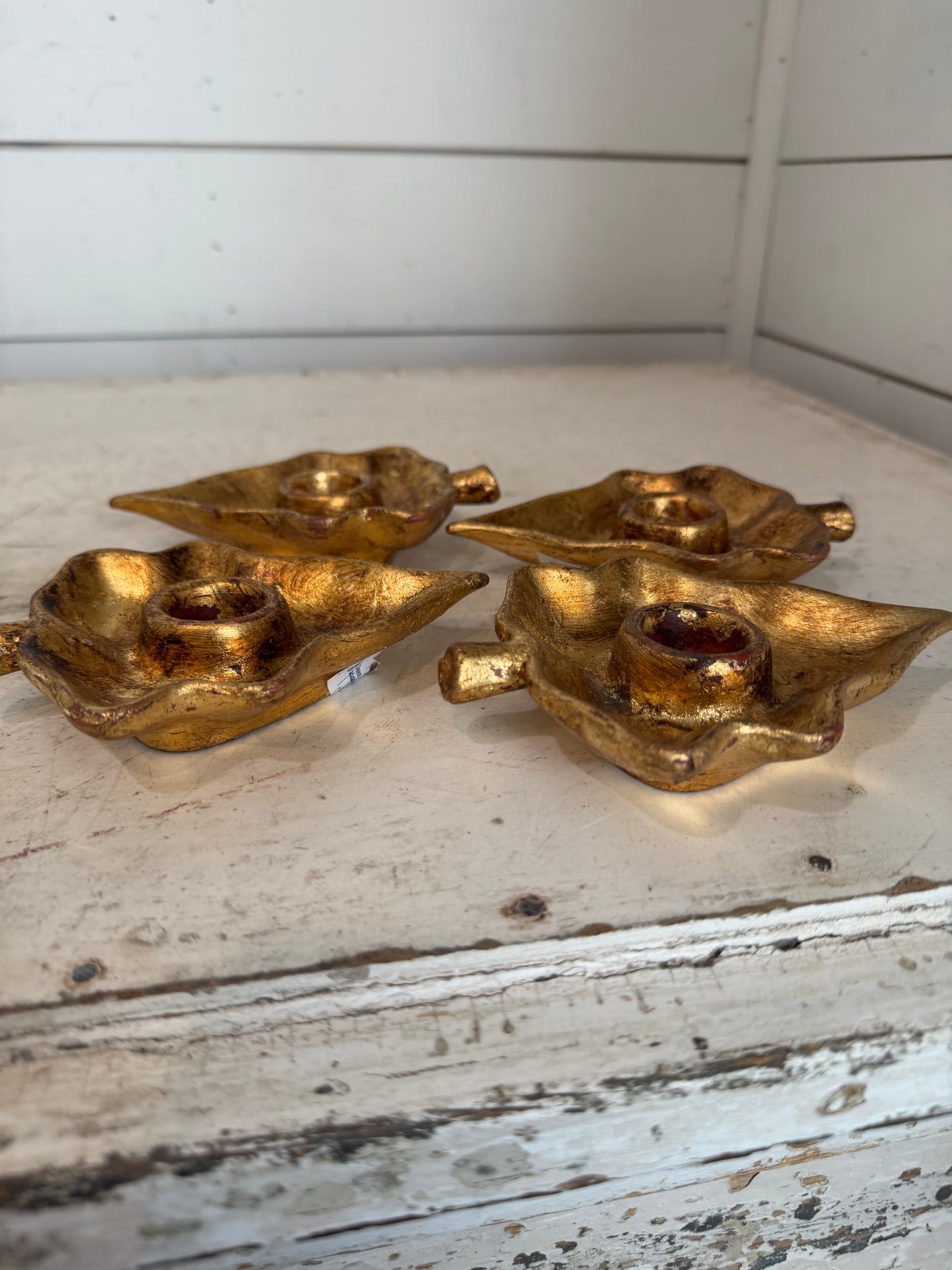 Set of four Vietri Italian gold gilt leaf-shaped candle holders