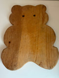 Vintage wooden teddy bear-shaped cutting board