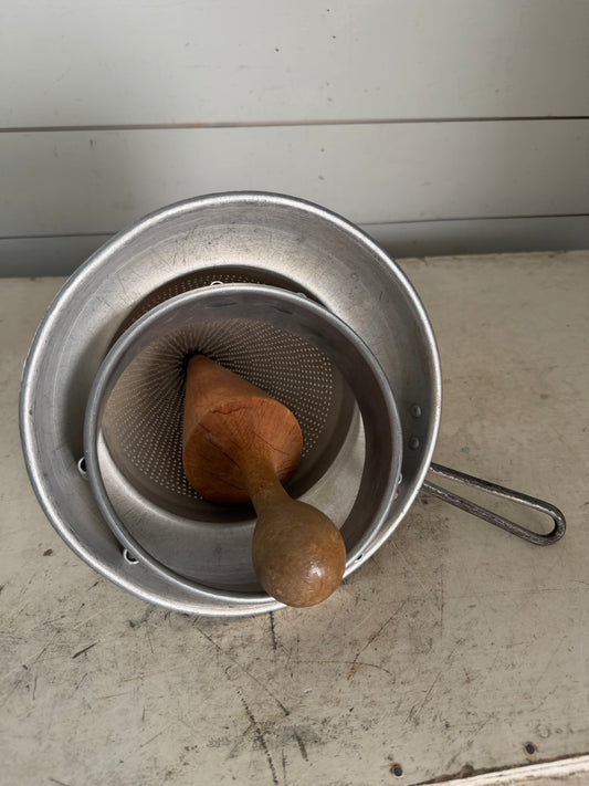Vintage sieve with pestal
