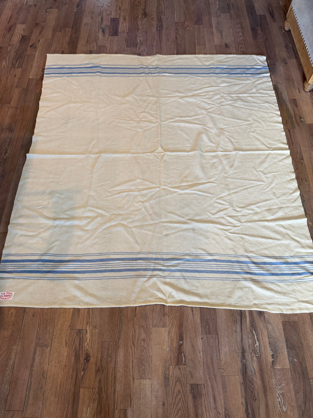 Cream wool blanket with blue stripes, twin size