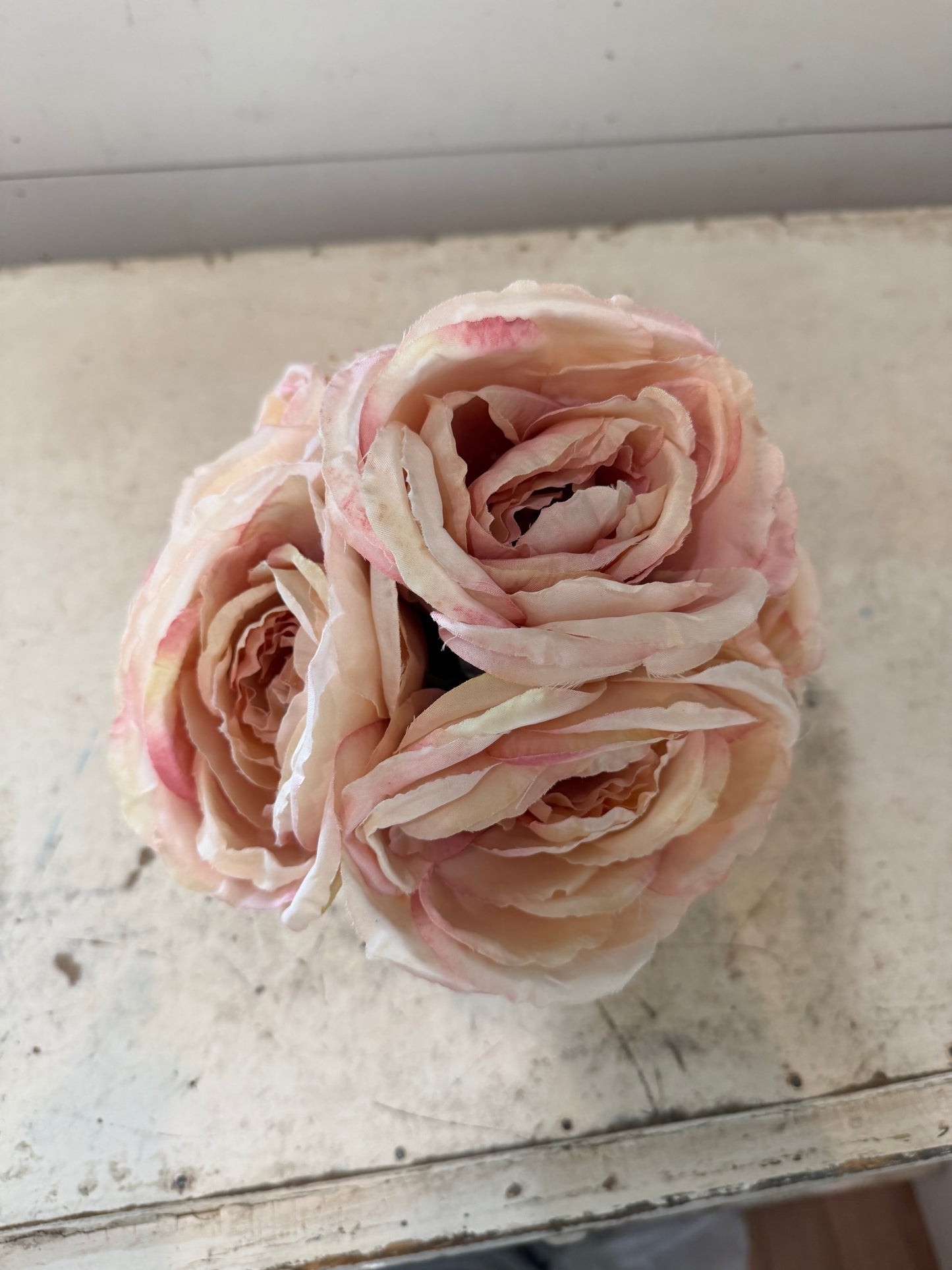 White porcelain pot with pink roses