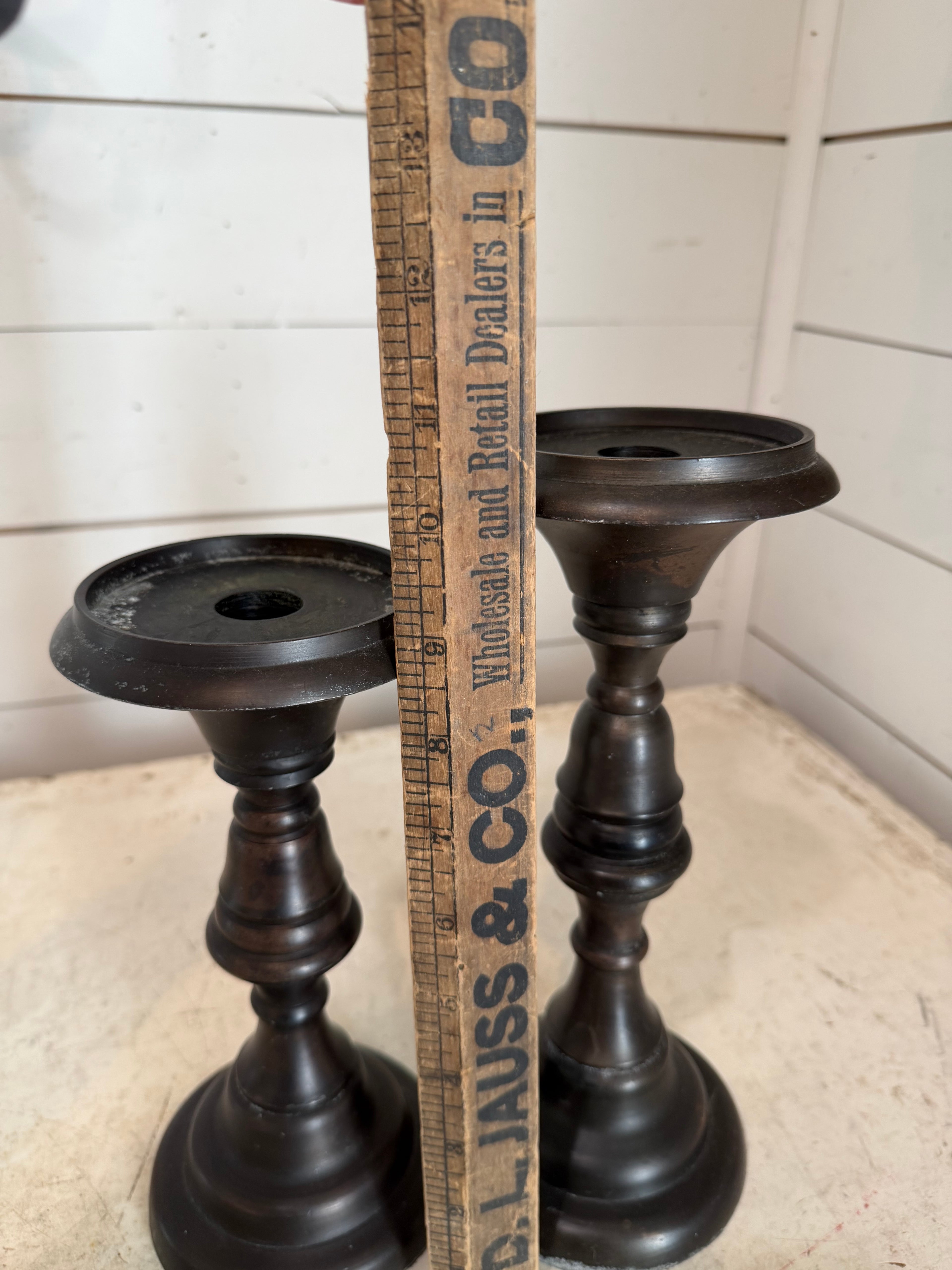Set of metal bronze color candlesticks