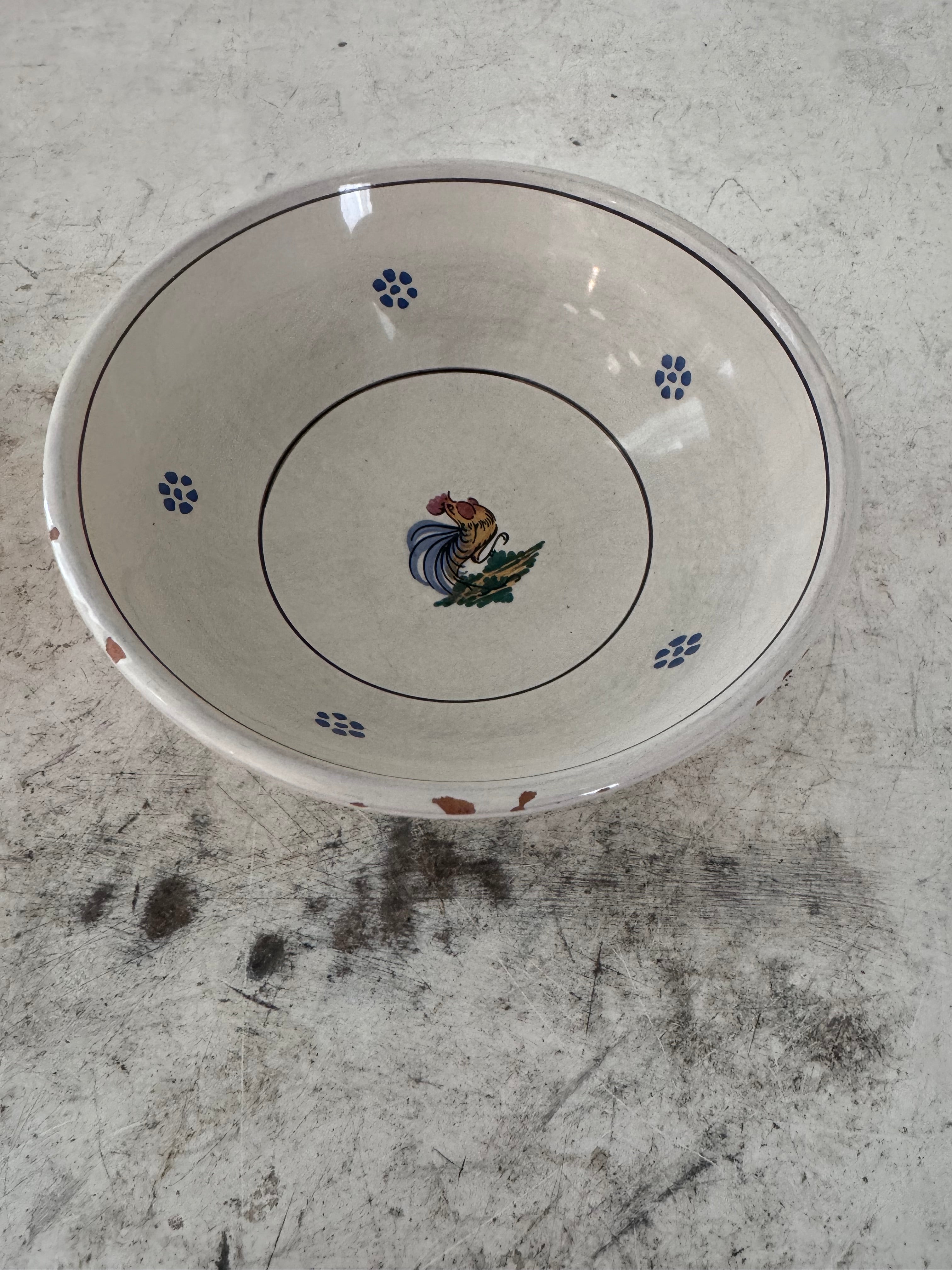 Small enameled terracotta bowl has chips - sold separately