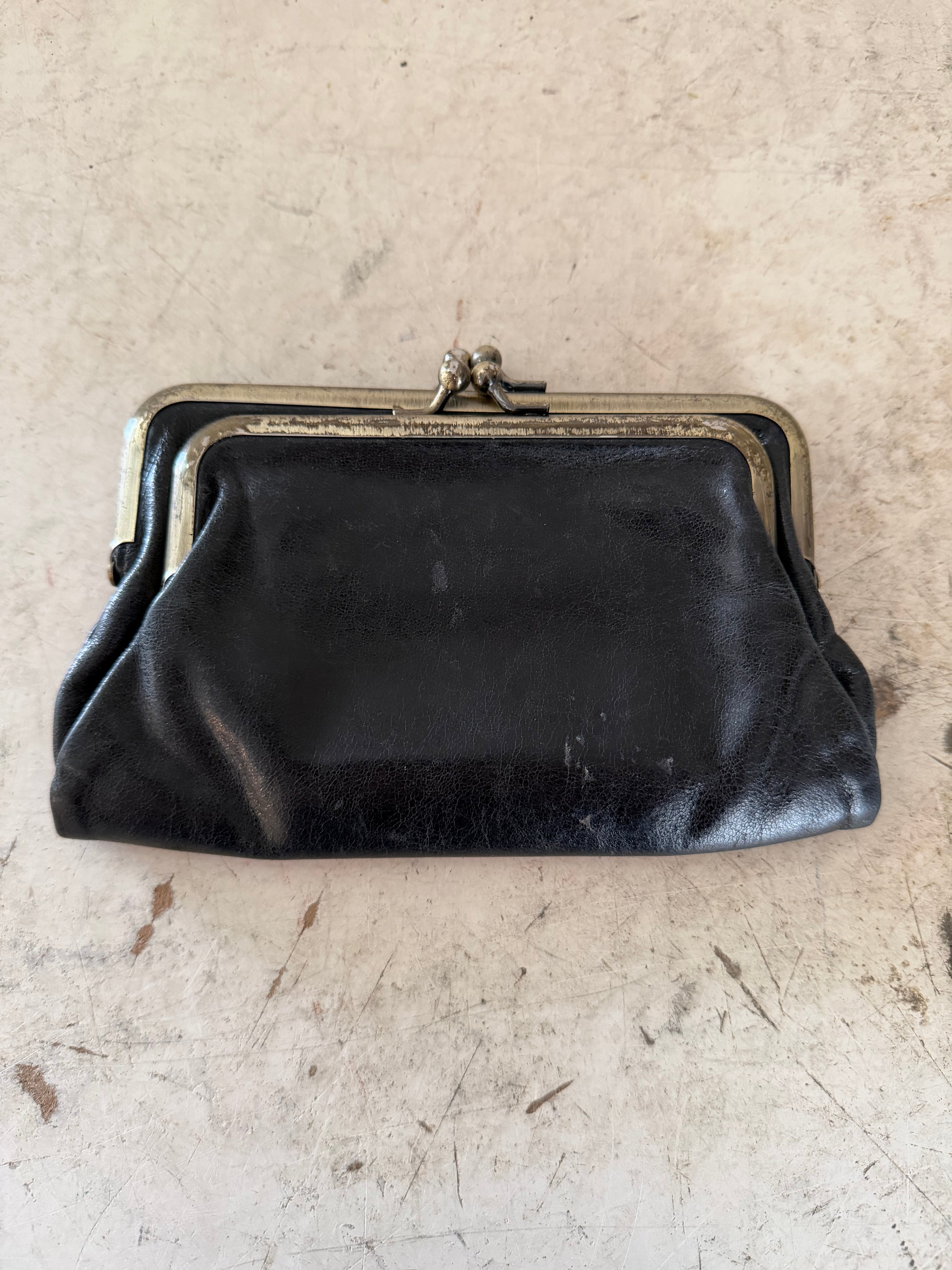 Black leather Hobo Lauren clutch wallet with a kiss-lock frame