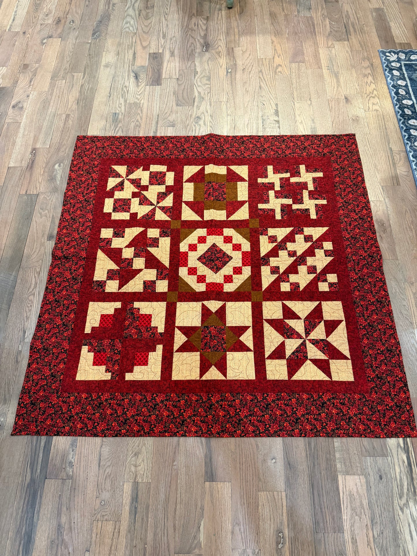 Small red and cream piece quilt throw size