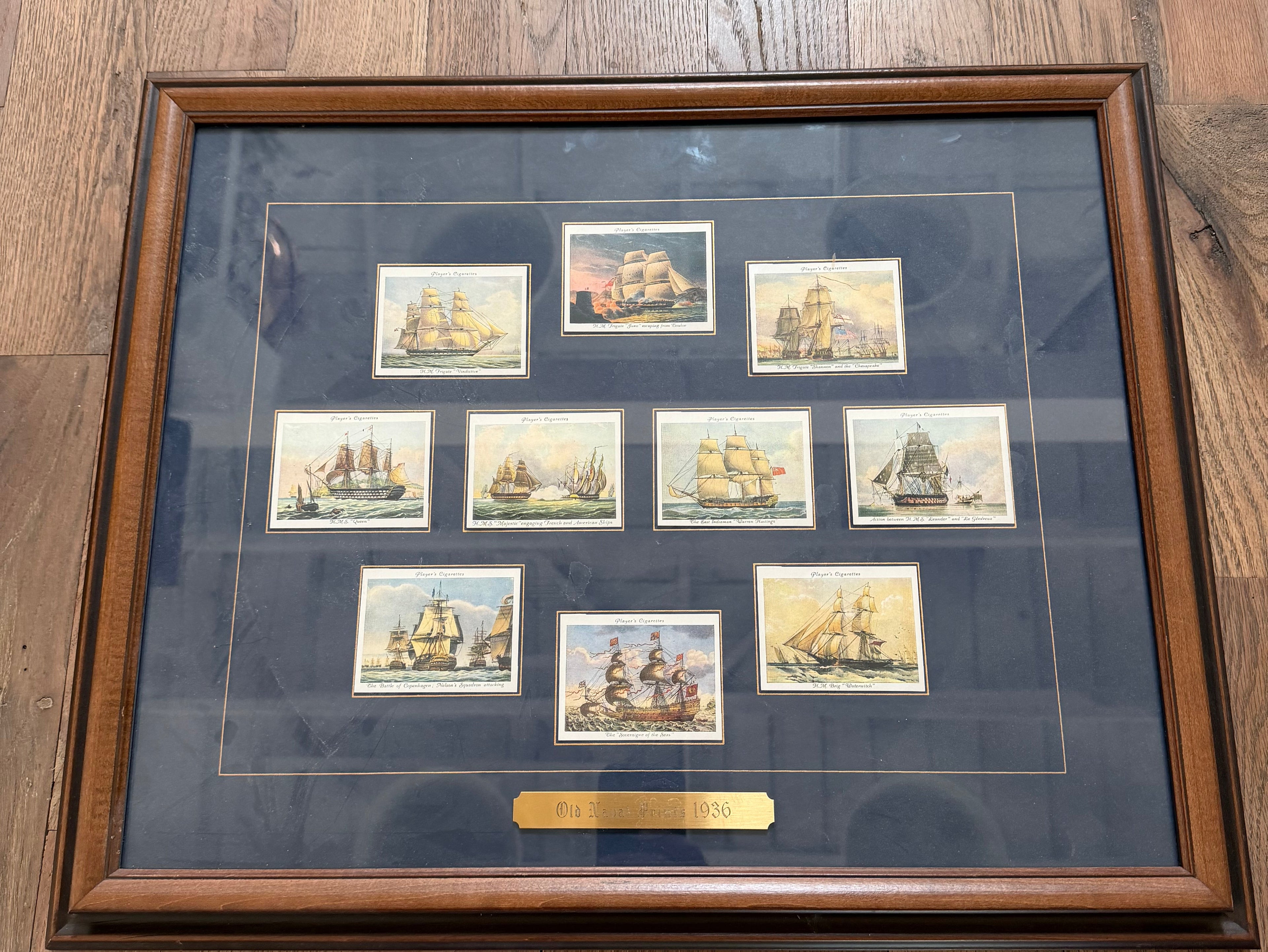 Framed collection of vintage John Player and Sons Old Naval Prints Cigarette Cards