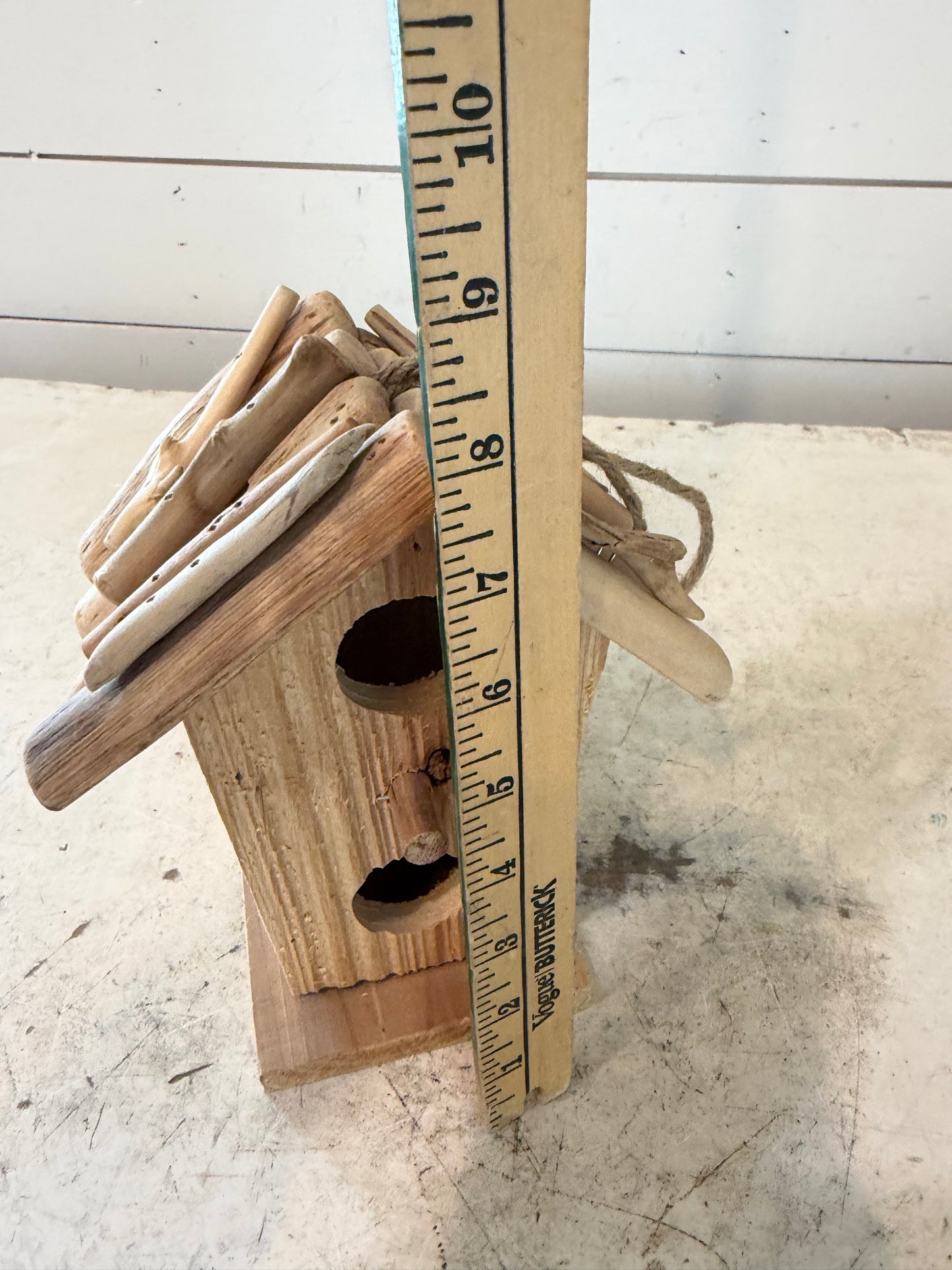 Rustic birdhouse with driftwood roof will get makeover